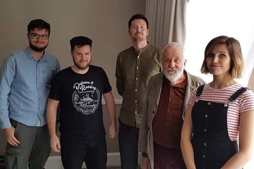 It is with heavy hearts that we say goodbye to our friend and fellow filmmaker, Christopher T. McGill, who passed away on Saturday, July 4th.

From Reece, C.J. and Craig’s days studying MA Filmmaking together at @uniwestscotland to collaborating through the @glasgowfilmcrew , Chris was a constant source of light.

C.J. had the privilege of editing his UWS shorts CRYPSIS and FIGHT THE TOWER, and Craig worked on these as well as his moving documentary IS IT ME.

The photo above is from a great day in 2018 when Chris, Craig, fellow classmate Mel Bestel, and Ged Fitzsimmons crewed a promo for PETERLOO (@peterloofilm ). (Pictured L-R: Craig, Ged, Chris, director Mike Leigh, and Mel).

To us, Chris was a genuine inspiration. Not only was he a brilliant filmmaker with a deeply human and creative eye, but he was also a golden-hearted human being. Our deepest sympathies go out to his loved ones.

Chris’s final project was his debut feature-length documentary, DON’T BE ALARMED (@dontbealarmed_film ) from Riot Productions (@riot.film ). The Crowdfunder is still active, and we would love to see his work supported. If you can, please consider contributing or sharing the campaign.

crowdfunder.co.uk/p/dont-be-alarmed-a-scottish-activism-documentary

See you on the other side, Chris. 🕊️✨